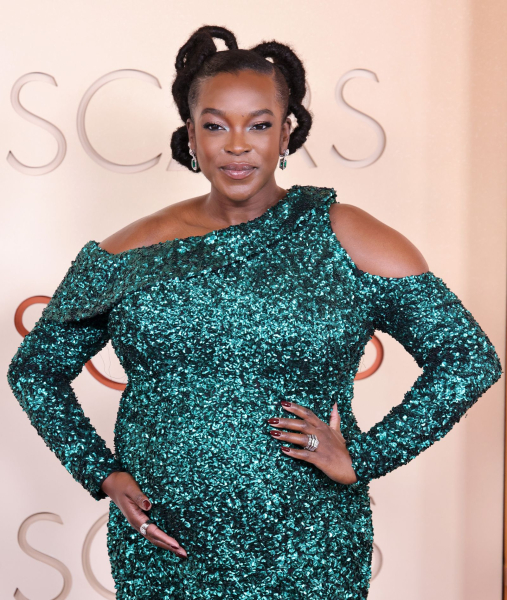 Wunmi Mosaku in a sparkling teal dress